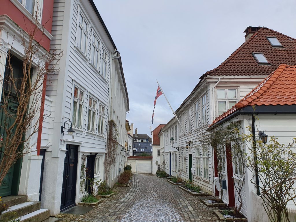 Nordnes, Bryggen, fishmarket, Johannes Church, Nordnes park, Hanseatic trade, old traditional wooden homes, cobbled streets.